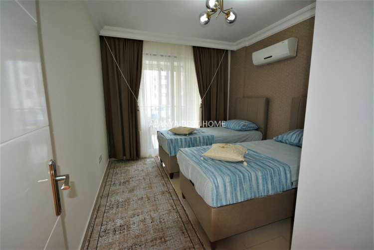 KESTEL'DE DENİZE 100 MT MESAFEDE AKTİVİTELİ SİTE İÇERİSİNDE 2+1 EŞYALI DAİRE