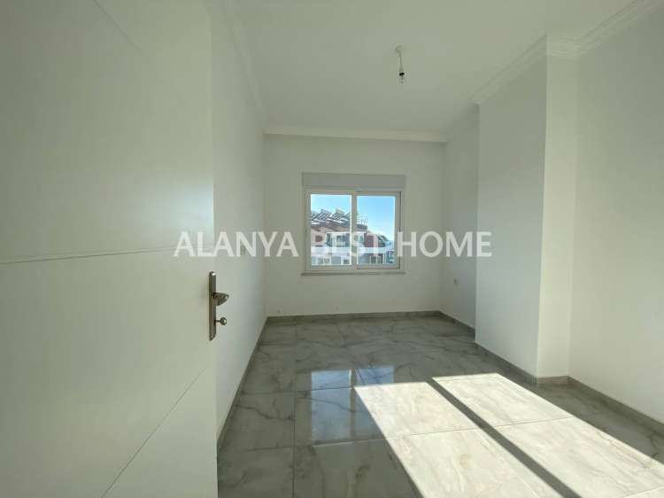 OBA'DA AKTİVİTELİ SİTE İÇERİSİNDE DENİZ VE KALE MANZARALI GÜNEY CEPHE 1+1 SATILIK DAİRE