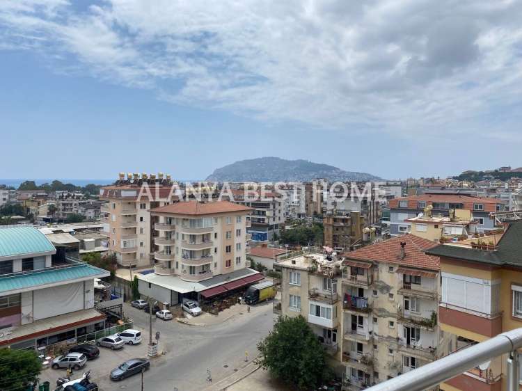 CİKCİLLİ'DE AKTİVİTELİ SİTE İÇERİSİNDE DENİZ VE KALE MANZARALI 4+1 EŞYALI DUBLEKS DAİRE